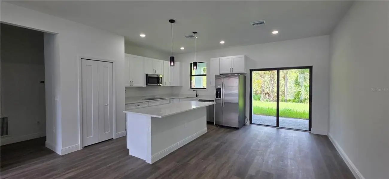 Furnished interior view inside a new home in , North Port (Image 3).