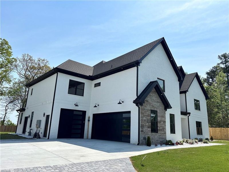 Front exterior of a new home in , Buford, GA, highlighting curb appeal (Image 31).
