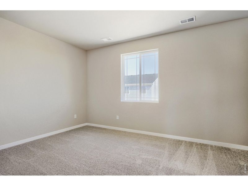 Spacious, unfurnished interior of a new home in Farmstead, Berthoud (Image 19).