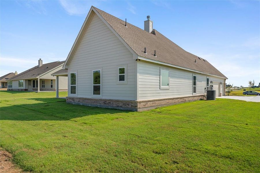 Front exterior of a new home in Fairview Meadows, New Fairview, TX, highlighting curb appeal (Image 17). Front exterior of a new home in Fairview Meadows, New Fairview, TX, highlighting curb appeal (Image 17).