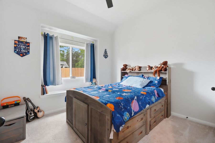 Bright secondary bedroom with a clean layout and plenty of space.