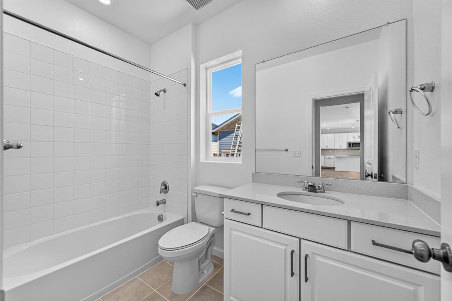Furnished interior view inside a new home in Trailstone, Arvada (Image 7).