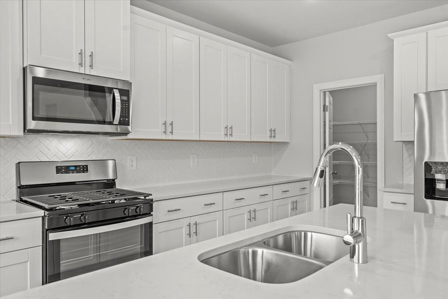 Furnished interior view inside a new home in Chatham Forest, Duncan (Image 10).