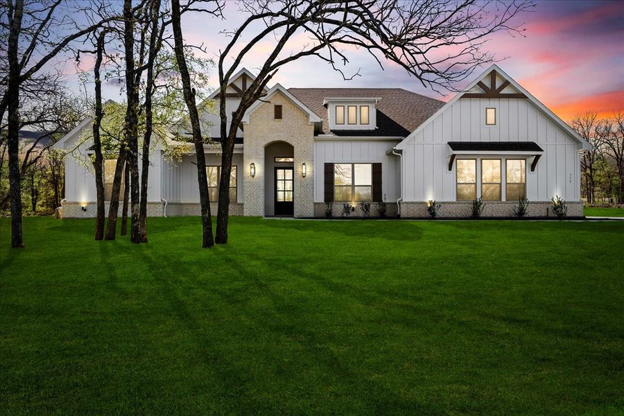 Front exterior of a new home in Spring Valley Ranch, Paradise, TX, highlighting curb appeal (Image 29).