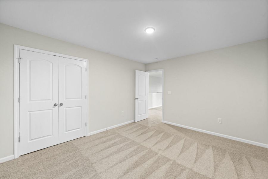 Spacious, unfurnished interior of a new home in Chandler Ridge, McLeansville (Image 38).