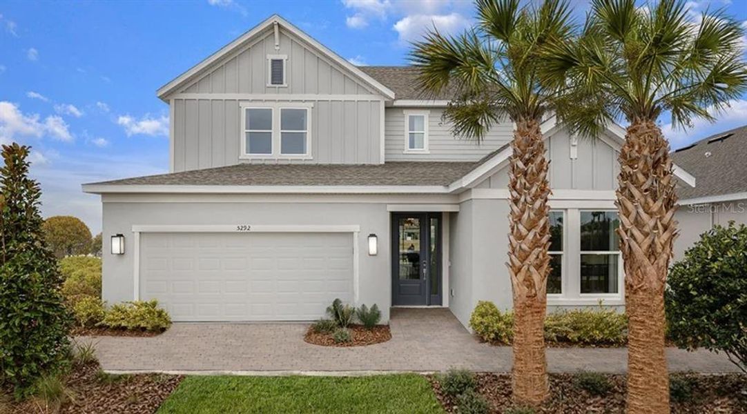 Front exterior of a new home in Center Lake Ranch Community Group Page, St. Cloud, FL, highlighting curb appeal (Image 1). Front exterior of a new home in Center Lake Ranch Community Group Page, St. Cloud, FL, highlighting curb appeal (Image 1).