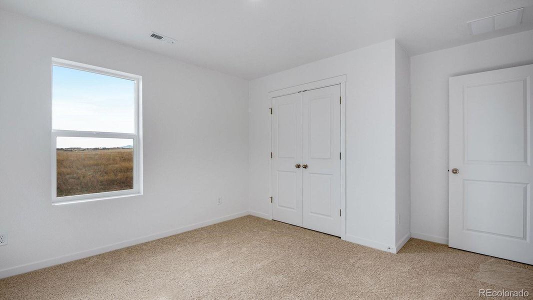 Spacious, unfurnished interior of a new home in Settlers Crossing, Commerce City (Image 34).