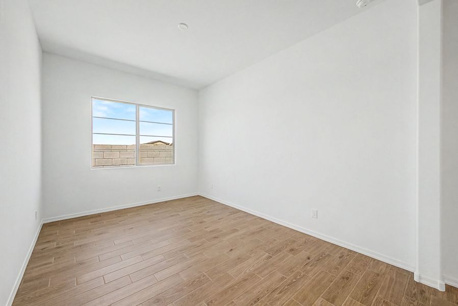 Spacious, unfurnished interior of a new home in Empire Pointe, Queen Creek (Image 12).