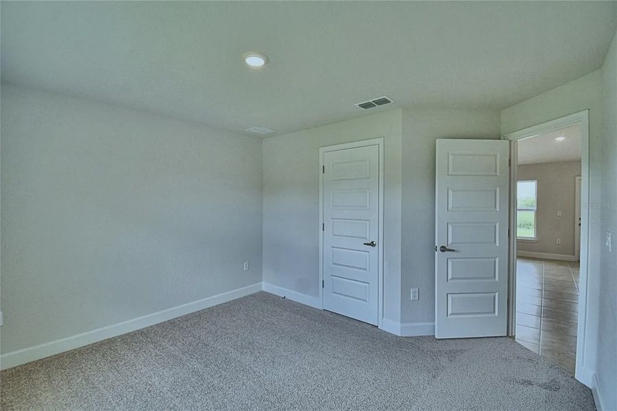 Spacious, unfurnished interior of a new home in Cadence Crossing, Auburndale (Image 22).
