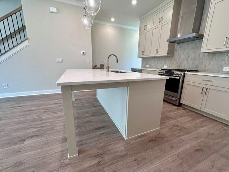 Furnished interior view inside a new home in Ward's Crossing Townhomes, Johns Creek (Image 10).