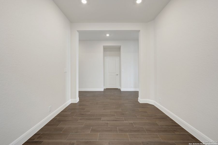Spacious, unfurnished interior of a new home in Windsong - Reserve Series, Boerne (Image 51).