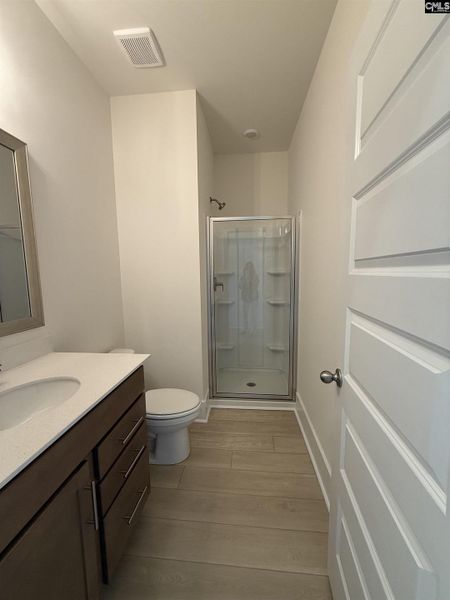 Furnished interior view inside a new home in Cottages at Roofs Pond, West Columbia (Image 11).
