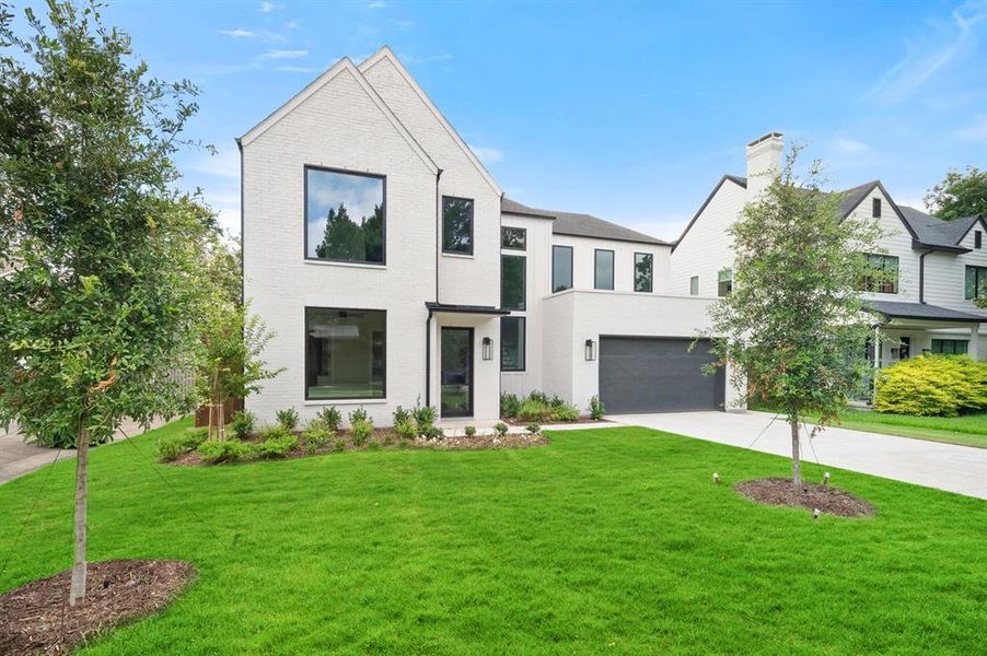 Front exterior of a new home in , Dallas, TX, highlighting curb appeal (Image 2). Front exterior of a new home in , Dallas, TX, highlighting curb appeal (Image 2).