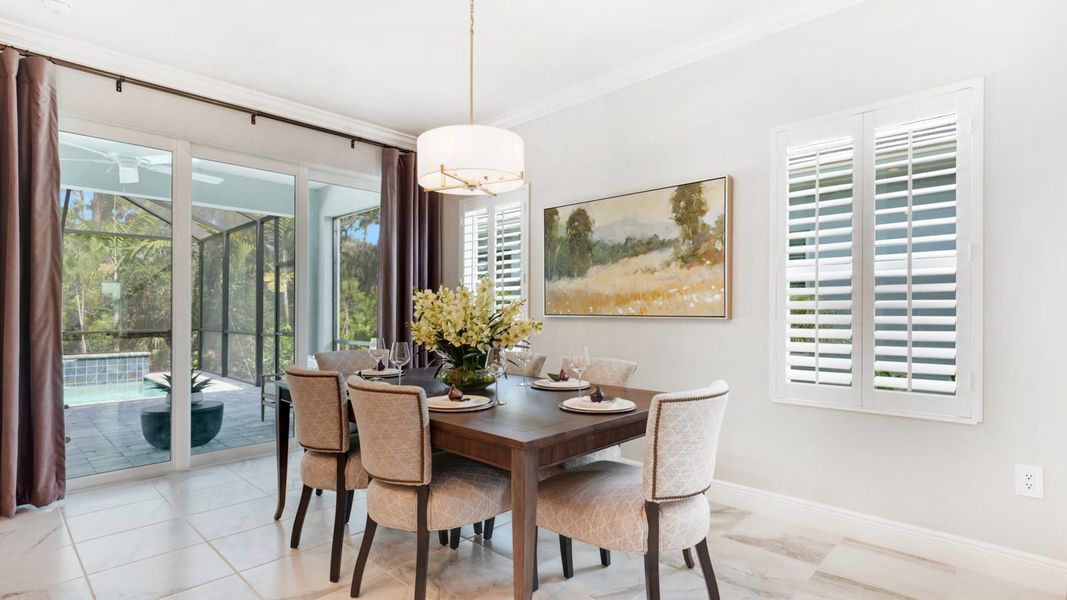 Representative furnished interior of a home built from the Patriot by Neal Communities in Boca Royale Golf & Country Club at Wellen Park, Englewood (Image 8).
