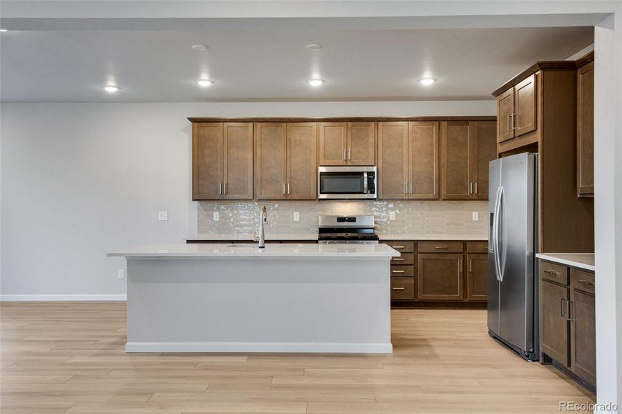 Furnished interior view inside a new home in Medley at Reunion Ridge, Commerce City (Image 14).