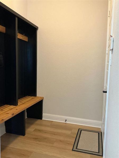 Mudroom featuring hardwood / wood-style floors