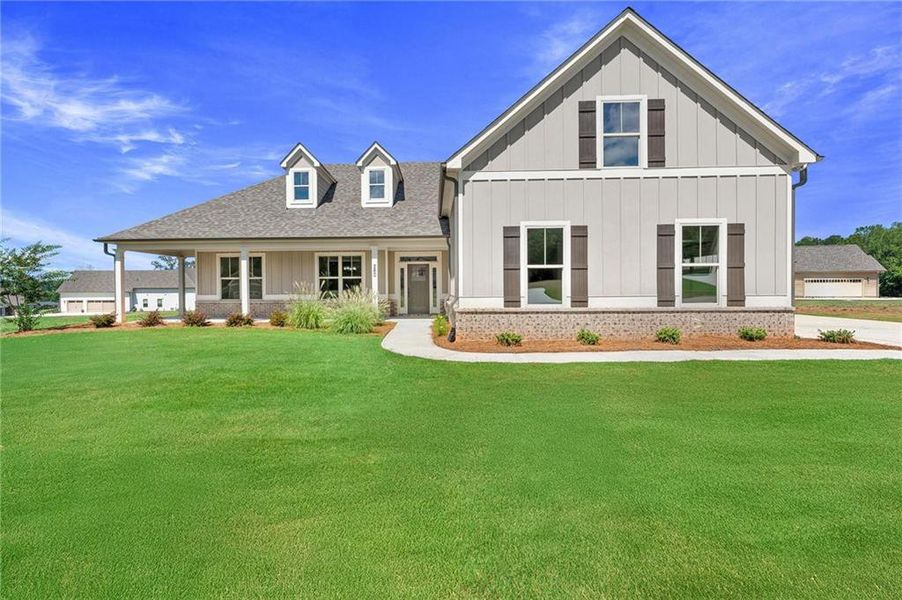 Front exterior of a new home in , Jefferson, GA, highlighting curb appeal (Image 1).