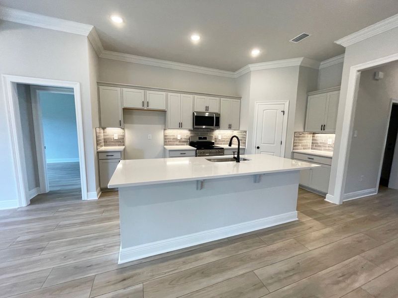 Furnished interior view inside a new home in Eagle Pointe, Pensacola (Image 4). Furnished interior view inside a new home in Eagle Pointe, Pensacola (Image 4).