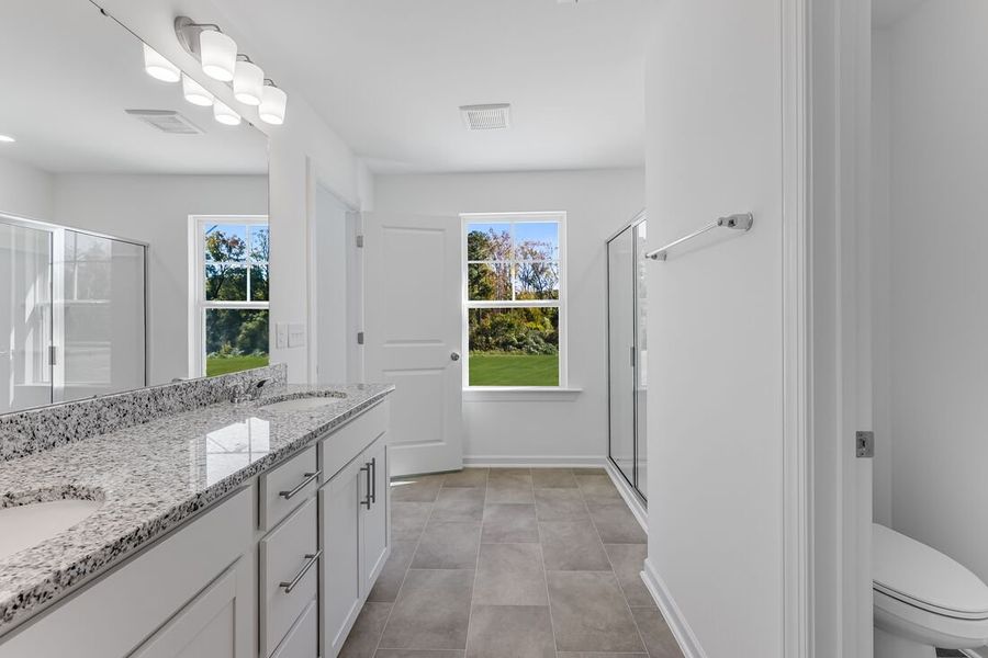 Furnished interior view inside a new home in Magnolia Townes, Wendell (Image 4).