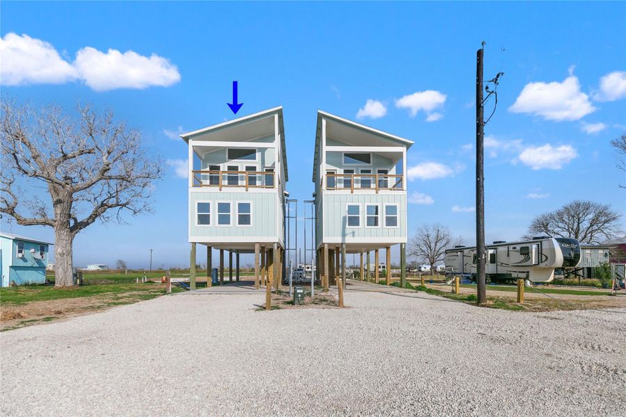 Front exterior of a new home in , Matagorda, TX, highlighting curb appeal (Image 15).