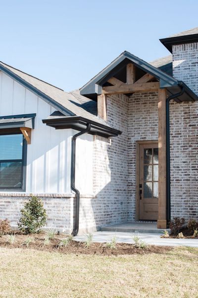 Representative exterior details of a home built from the The Landry by Reece Homes in Pebble Creek, College Station (Image 3).
