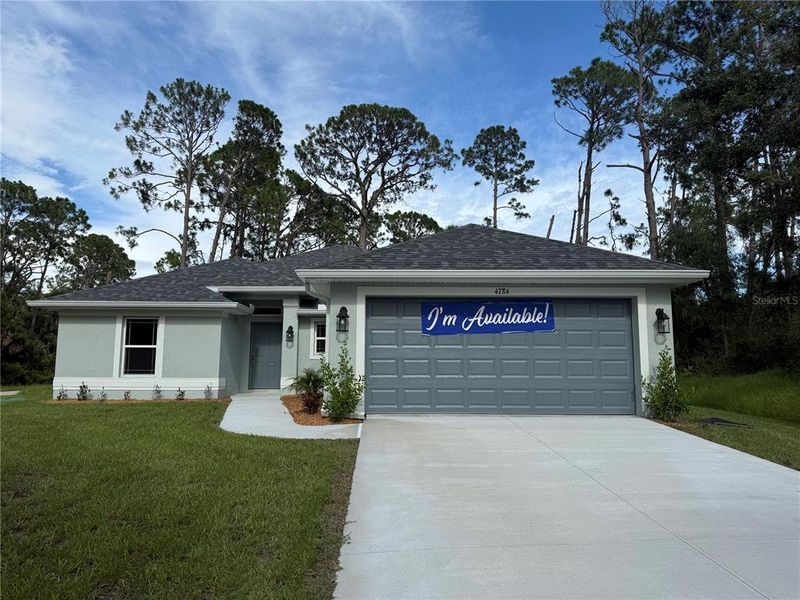 Front exterior of a new home in North Port, North Port, FL, highlighting curb appeal (Image 2).