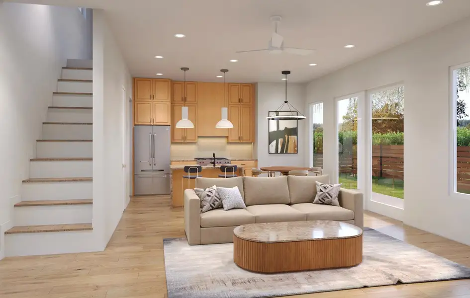Living area featuring stairway, recessed lighting, light wood finished floors, and a ceiling fan Living area featuring stairway, recessed lighting, light wood finished floors, and a ceiling fan