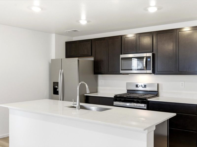 Furnished interior view inside a new home in Skyview at High Point, Aurora (Image 3).