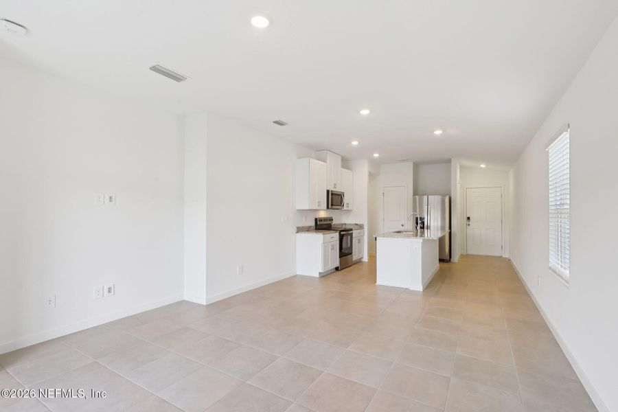 Spacious, unfurnished interior of a new home in Flagler Village - Classic Series, Palm Coast (Image 15).