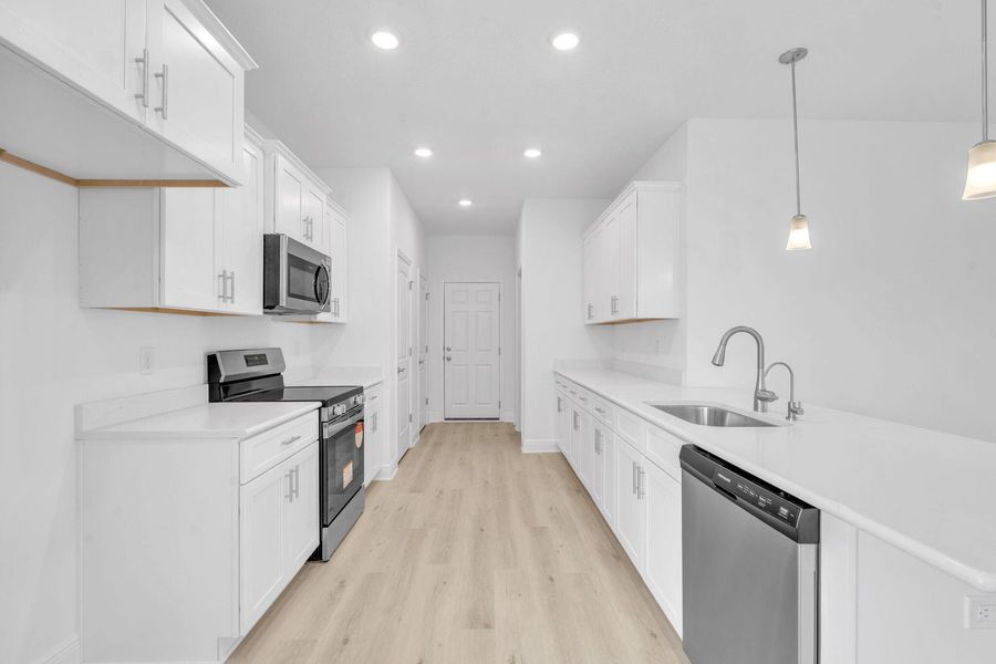 Representative furnished interior of a home built from the 2525 by Adams Homes in Parkland Place, Pace (Image 5).