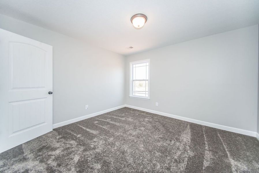 Representative unfurnished interior of a home built from the Archer by Enchanted Homes in Lonesome Dove, San Antonio (Image 35).