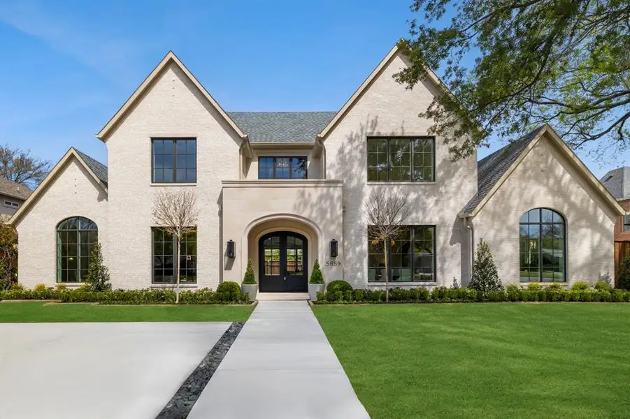 Front exterior of a new home in , Dallas, TX, highlighting curb appeal (Image 1). Front exterior of a new home in , Dallas, TX, highlighting curb appeal (Image 1).