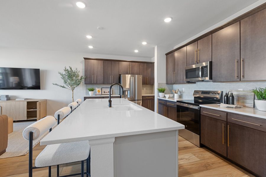 Representative furnished interior of a home built from the The Windom by Risewell Homes in Cordovan, Firestone (Image 10).