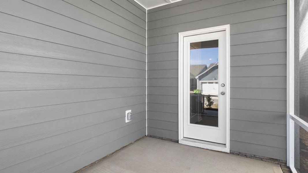 Exterior details and patio area of a home in The Villas at Haywood Glen, Knightdale (Image 3).