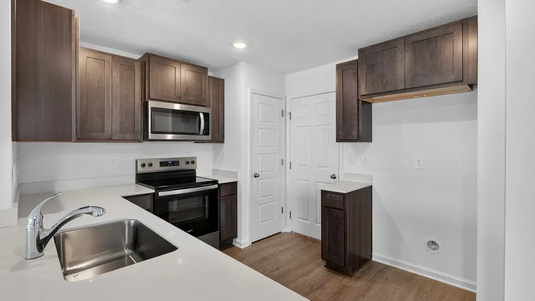 Representative furnished interior of a home built from the Weston by D.R. Horton in Bridle Creek Townhomes, Jacksonville (Image 7).