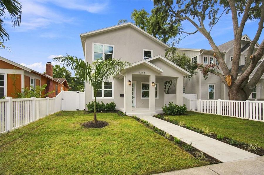 Front exterior of a new home in , St. Petersburg, FL, highlighting curb appeal (Image 1). Front exterior of a new home in , St. Petersburg, FL, highlighting curb appeal (Image 1).