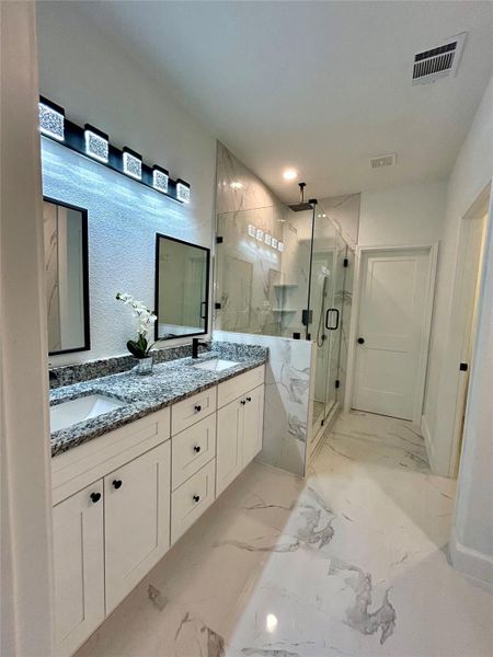 Double vanity in the primary bathroom.