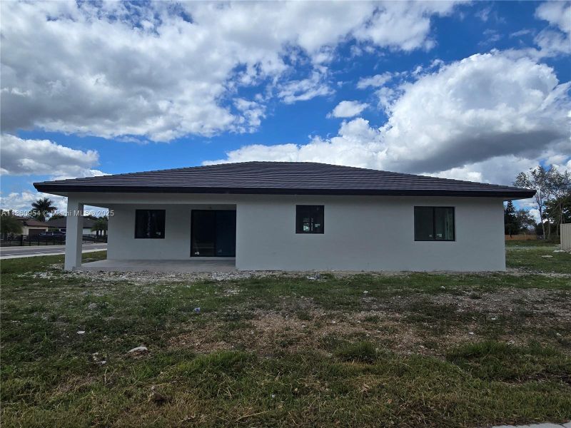 Front exterior of a new home in , Miami, FL, highlighting curb appeal (Image 20).