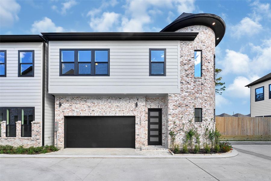 Front exterior of a new home in , Houston, TX, highlighting curb appeal (Image 1). Front exterior of a new home in , Houston, TX, highlighting curb appeal (Image 1).