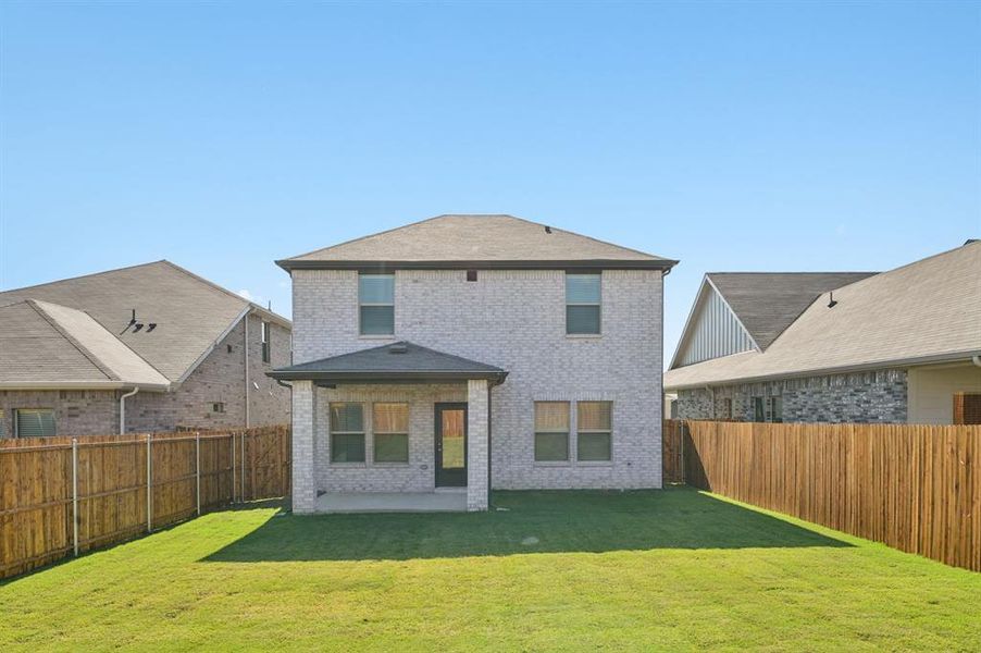 Exterior details and patio area of a home in Simpson Crossing - Spring Series, McKinney (Image 3). Exterior details and patio area of a home in Simpson Crossing - Spring Series, McKinney (Image 3).