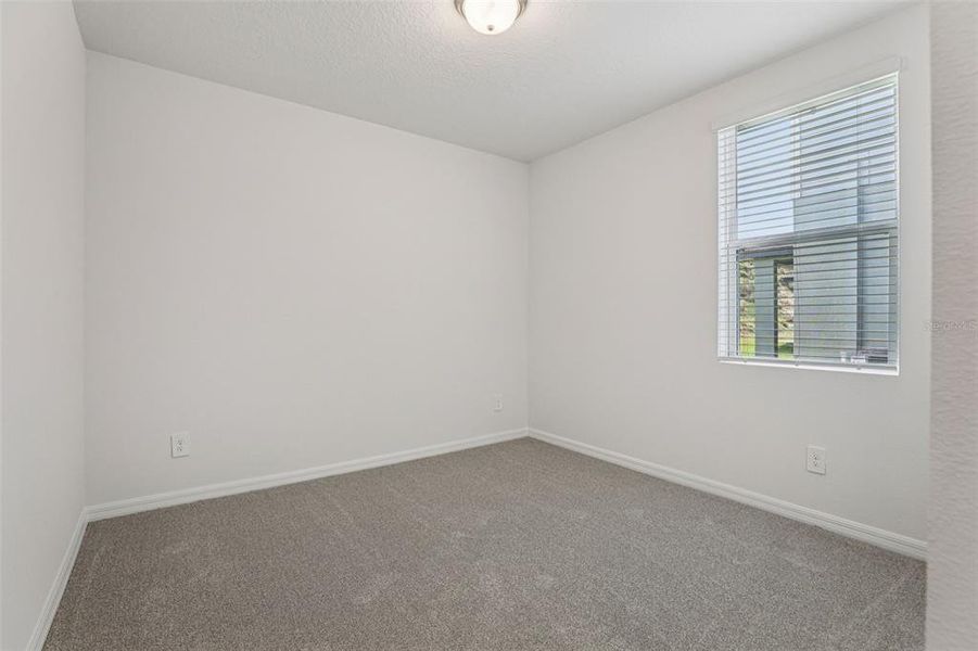 Spacious, unfurnished interior of a new home in Crosswinds - Signature Series, Haines City (Image 29).