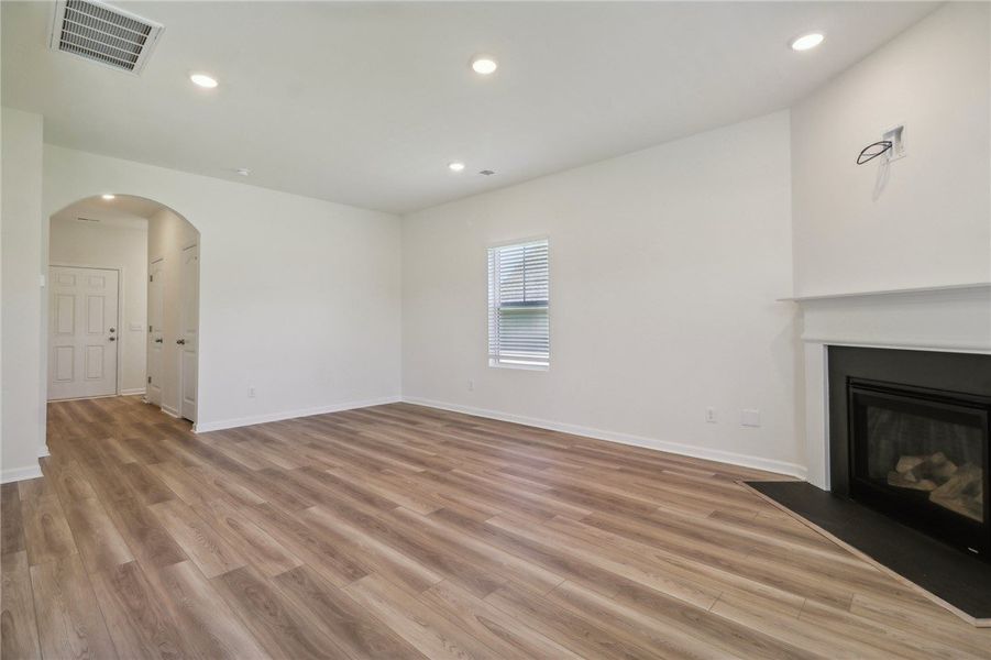 This bright living space features clean lines and This bright living space features clean lines and