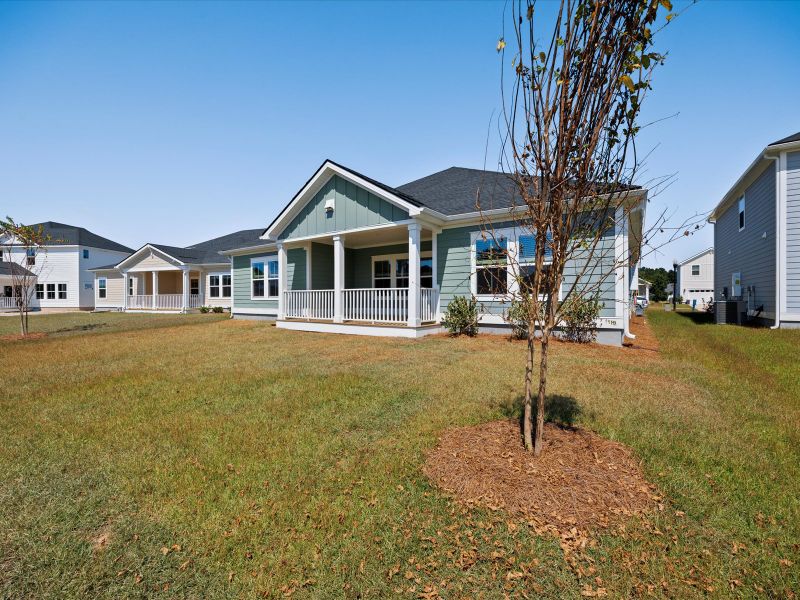 Exterior details and patio area of a home in The Coves at Lakes of Cane Bay II, Summerville (Image 25). Exterior details and patio area of a home in The Coves at Lakes of Cane Bay II, Summerville (Image 25).
