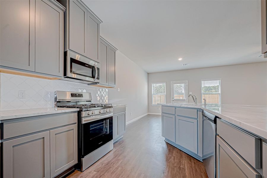 Furnished interior view inside a new home in Mill Creek Trails, Magnolia (Image 7).