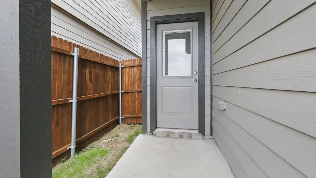 Exterior details and patio area of a home in Orchard Village, Fort Worth (Image 2). Exterior details and patio area of a home in Orchard Village, Fort Worth (Image 2).