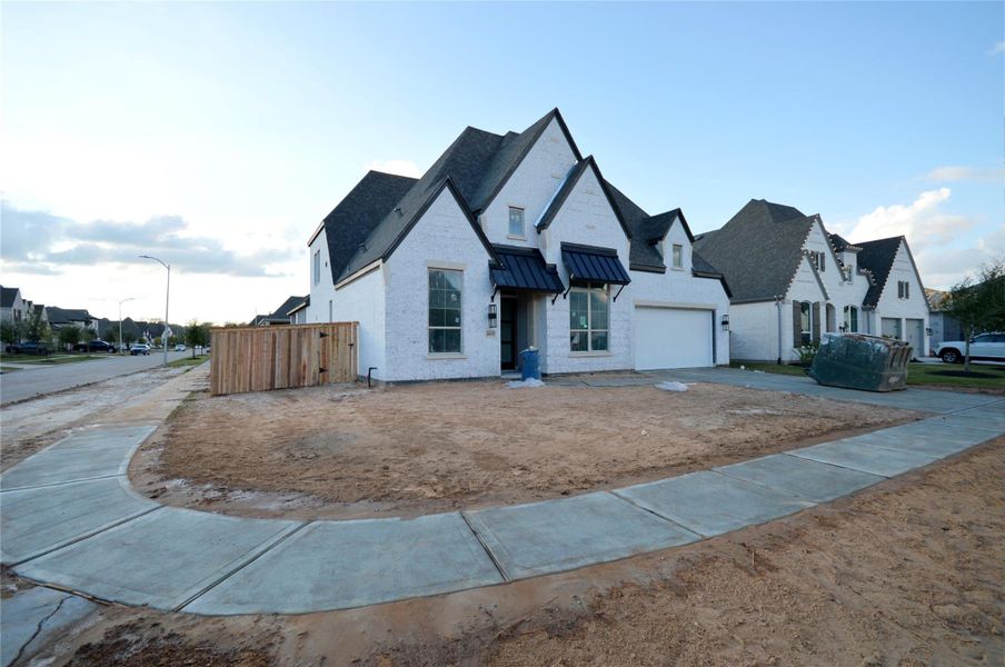 In-progress construction of a new home in Fulbrook on Fulshear Creek: 60ft. lots, Fulshear, TX (Image 14).