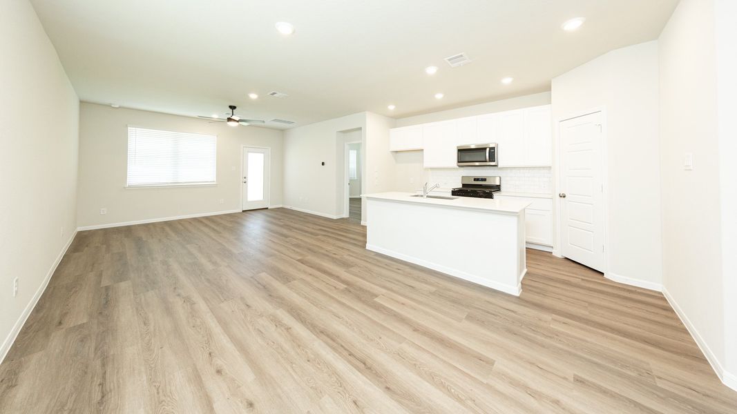 Kitchen to Dining Area and Family Room