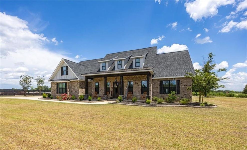 Front exterior of a new home in , Kathleen, GA, highlighting curb appeal (Image 24).