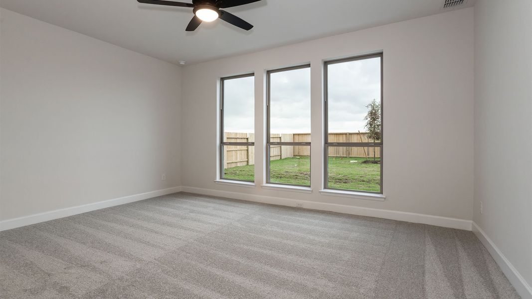 Spacious, unfurnished interior of a new home in Lakes of Cane Island, Katy (Image 15).