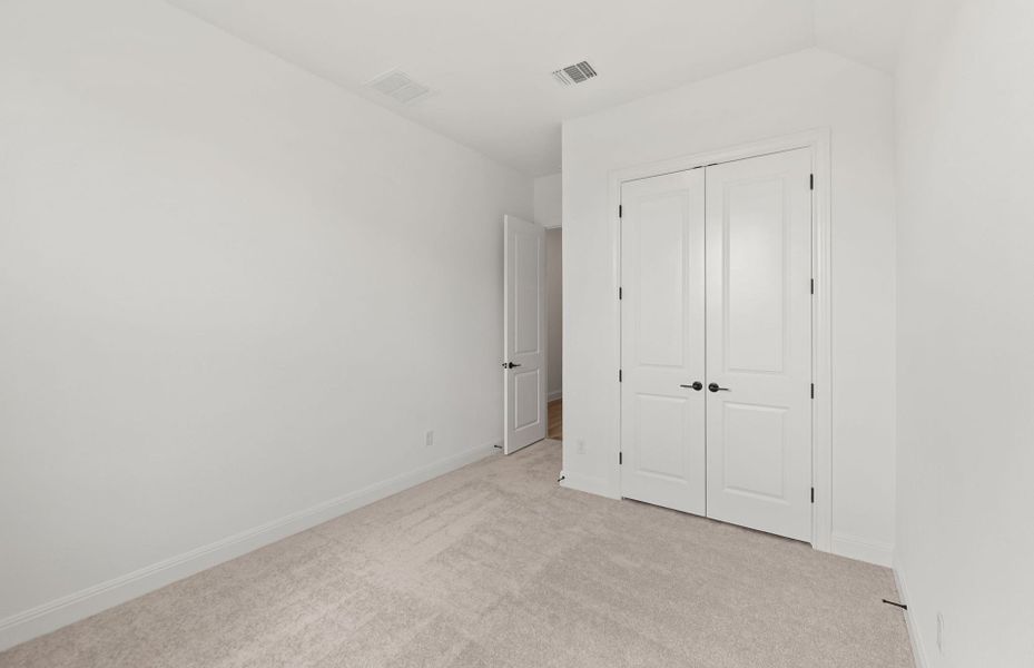 Spacious, unfurnished interior of a new home in Bluffview Reserve, Leander (Image 65).